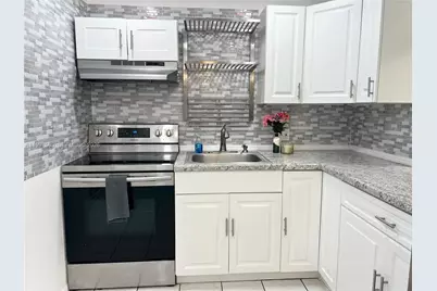 6150 NW 62nd St #106, Tamarac, FL 33319 - Photo 1