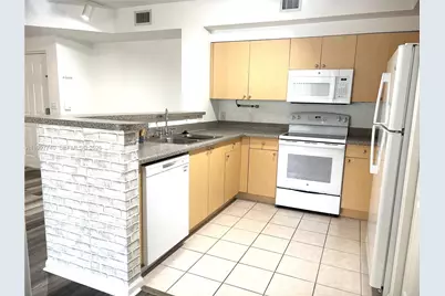 8050 N Nob Hill Rd #105, Tamarac, FL 33321 - Photo 5