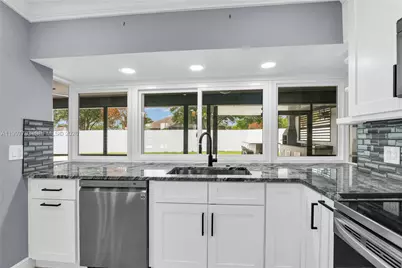 702 NW Orchid St, Port Saint Lucie, FL 34983 - Photo 25