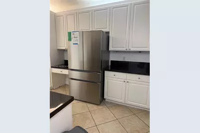 10720 NW 66th St #112, Doral, FL 33178 - Photo 9