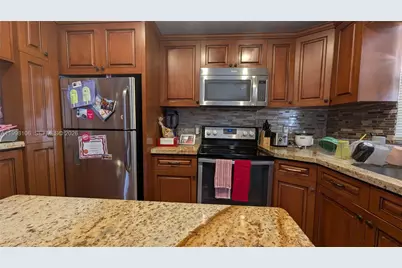 6001 Shakerwood Cir #205, Tamarac, FL 33319 - Photo 9