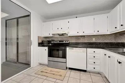 671 NE 195th St #114E, Miami, FL 33179 - Photo 7