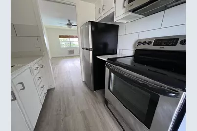 1350 E Sample Rd #306, Pompano Beach, FL 33064 - Photo 3