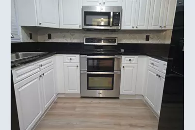 11091 NW 7th St #104, Miami, FL 33172 - Photo 5