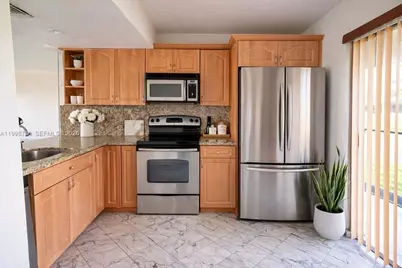 1283 W 51st Place #12, Hialeah, FL 33012 - Photo 5