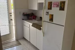 450 Golden Isles Dr, Hallandale Beach, FL 33009 - Photo 9