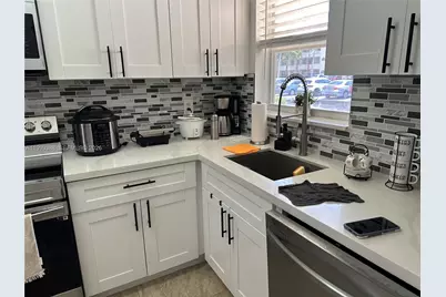 8021 N Sunrise Lakes Dr #101, Sunrise, FL 33322 - Photo 1