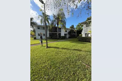823 NE 199th St #104-12, Miami, FL 33179 - Photo 1
