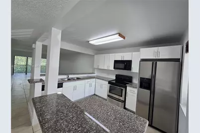 310 Racquet Club Rd #204, Weston, FL 33326 - Photo 9