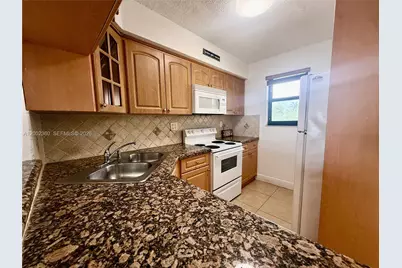 8500 NW 8th St #308, Miami, FL 33126 - Photo 13