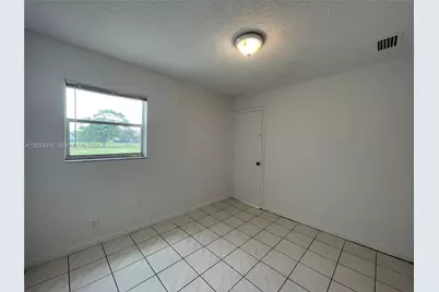 7410 Woodmont Ter #204, Tamarac, FL 33321 - Photo 9
