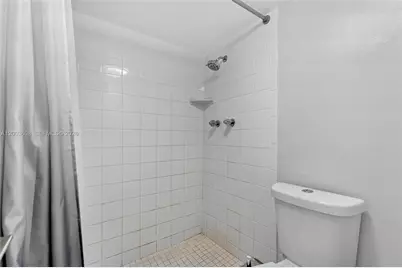 401 Golden Isles Dr #303, Hallandale Beach, FL 33009 - Photo 15
