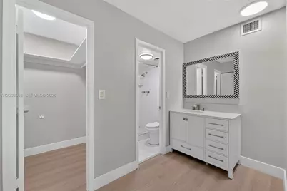 401 Golden Isles Dr #303, Hallandale Beach, FL 33009 - Photo 13