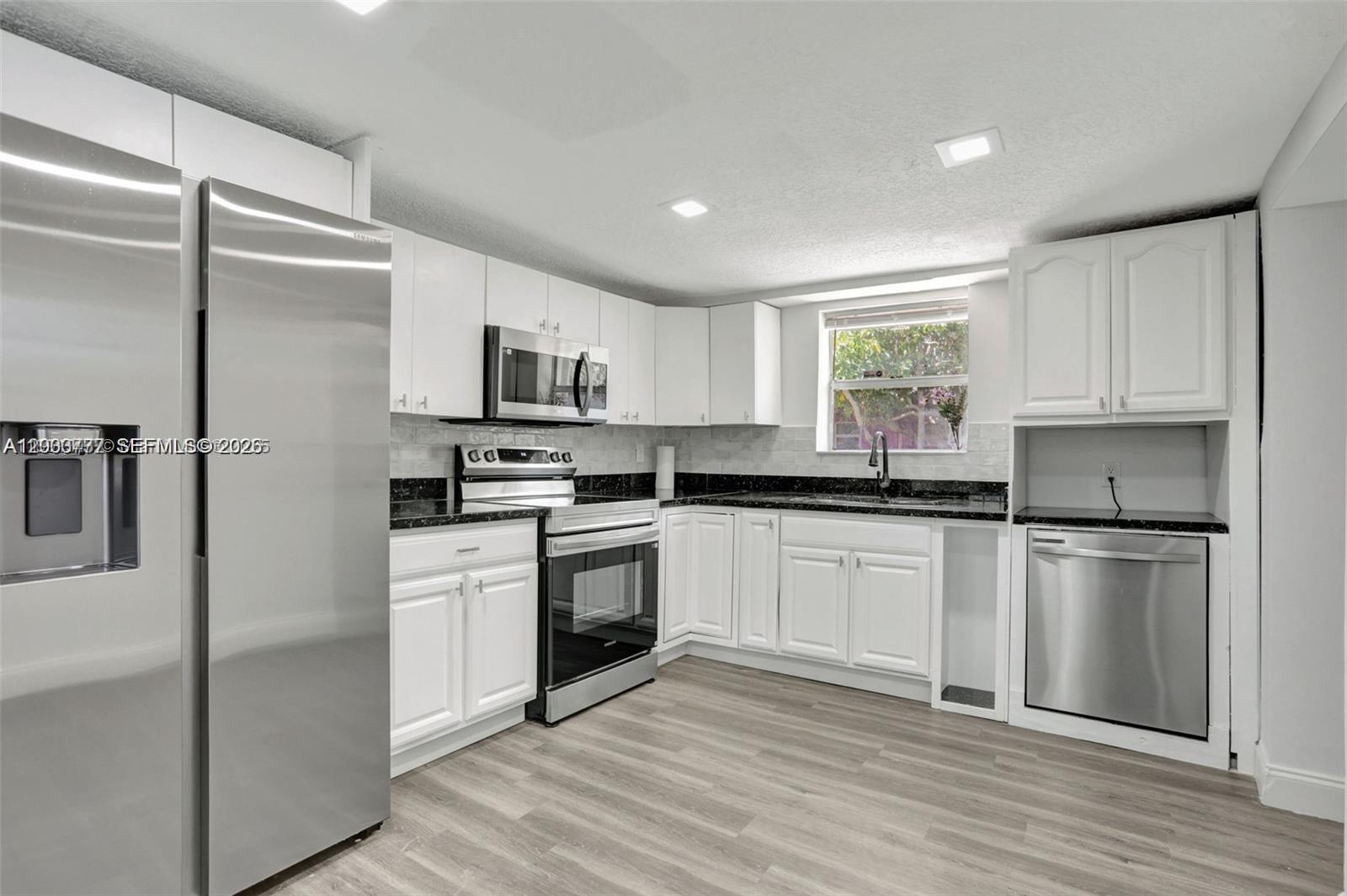 2701 NW 18th Terrace #A - 2701 NW 18th Terrace #A, Oakland Park, FL 33311 Luxury Property | Jose Angel Pina
