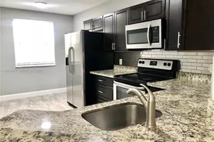 8761 Wiles Rd, Coral Springs, FL 33067 - Photo 1