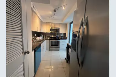 301 Golden Isles Dr #409, Hallandale Beach, FL 33009 - Photo 5