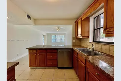 2320 S Cypress Bend Dr #204, Pompano Beach, FL 33069 - Photo 5