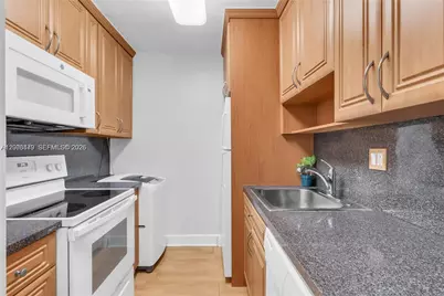 5055 NW 7th St #504, Miami, FL 33126 - Photo 5