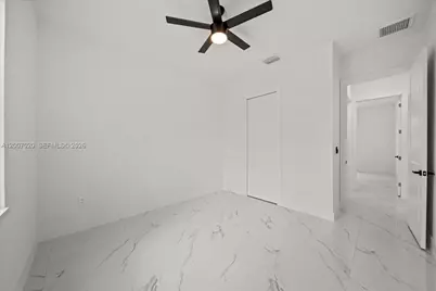 1033 E Plymouth St E, Lehigh Acres, FL 33974 - Photo 33