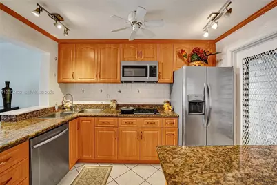 455 Paradise Isle Blvd #104, Hallandale Beach, FL 33009 - Photo 9