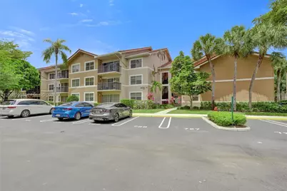 8721 Wiles Rd #101, Coral Springs, FL 33067 - Photo 1