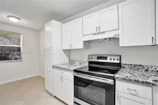 8721 Wiles Rd, Coral Springs, FL 33067 - Photo 9