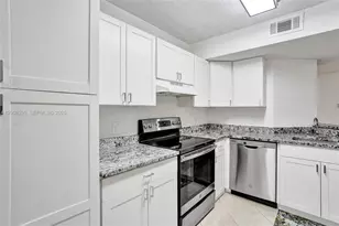 8721 Wiles Rd, Coral Springs, FL 33067 - Photo 13