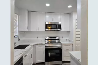 11477 NW 39th Ct #205-1, Coral Springs, FL 33065 - Photo 5