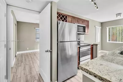 5686 Rock Island Rd #127, Tamarac, FL 33319 - Photo 5