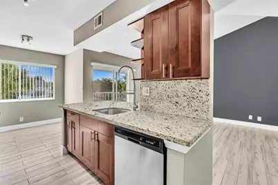5686 Rock Island Rd #127, Tamarac, FL 33319 - Photo 3