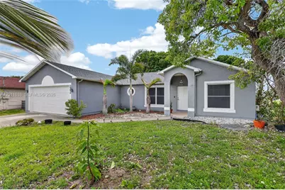 3936 SW Jarmer Rd, Port Saint Lucie, FL 34953 - Photo 1