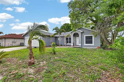 3936 SW Jarmer Rd, Port Saint Lucie, FL 34953 - Photo 3
