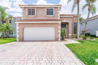 303 Bridgeton Rd, Weston, FL 33326 - Photo 1