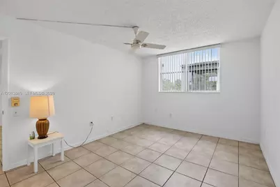 9090 Lime Bay Blvd #203, Tamarac, FL 33321 - Photo 11