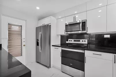 1075 93rd St #207, Bay Harbor Islands, FL 33154 - Photo 9
