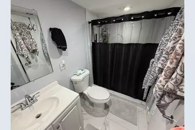 5033 NW 7th St #209, Miami, FL 33126 - Photo 5