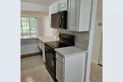 3070 NW 48th Ter #104, Lauderdale Lakes, FL 33313 - Photo 3