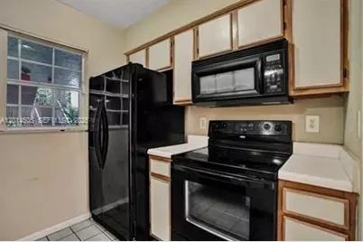 2871 N Oakland Forest Dr #210, Oakland Park, FL 33309 - Photo 21