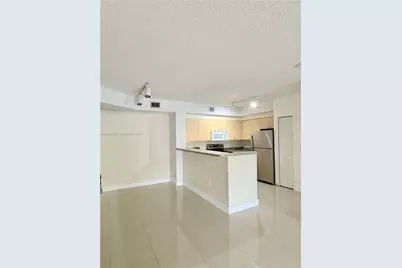 8030 N Nob Hill Rd #105, Tamarac, FL 33321 - Photo 3