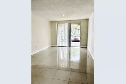8030 N Nob Hill Rd #105, Tamarac, FL 33321 - Photo 5