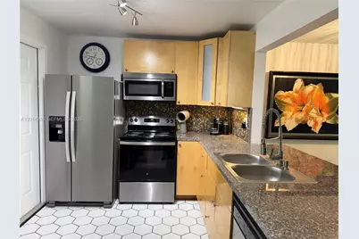 1351 NE 191st St #E119, Miami, FL 33179 - Photo 15