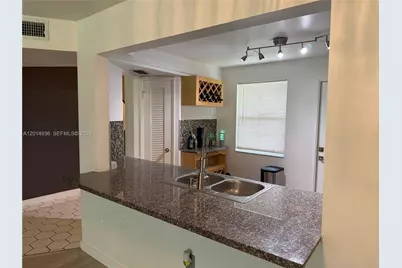 1351 NE 191st St #E119, Miami, FL 33179 - Photo 17