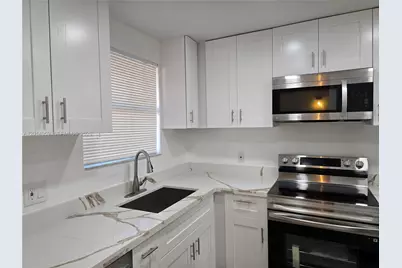 11477 NW 39th Ct #205-1, Coral Springs, FL 33065 - Photo 9