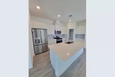 1689 Whistlegrass Ln #1689, Loxahatchee, FL 33470 - Photo 9