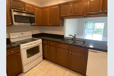 4291 NW 9th Ave #202, Deerfield Beach, FL 33064 - Photo 9