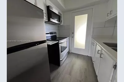 1350 E Sample Rd #306, Pompano Beach, FL 33064 - Photo 1