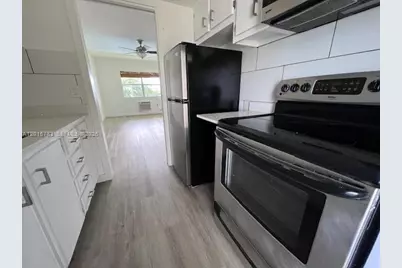 1350 E Sample Rd #306, Pompano Beach, FL 33064 - Photo 3