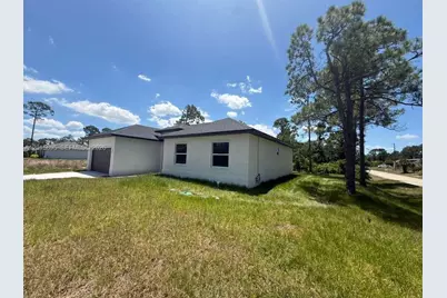 908 Winters St E, Lehigh Acres, FL 33974 - Photo 21