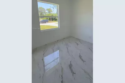 908 Winters St E, Lehigh Acres, FL 33974 - Photo 13