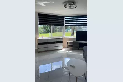 1701 NE 191st St #A104, Miami, FL 33179 - Photo 13
